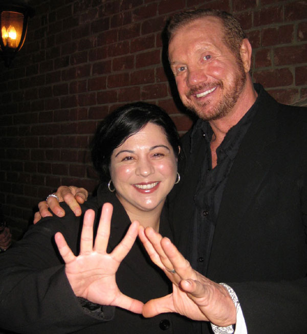 Actor and wrestler Diamond Dallas Page with guest attend the Grand Opening of Radical Publishing held at the Radical Publishing offices on February 19, 2009 in Los Angeles, California.